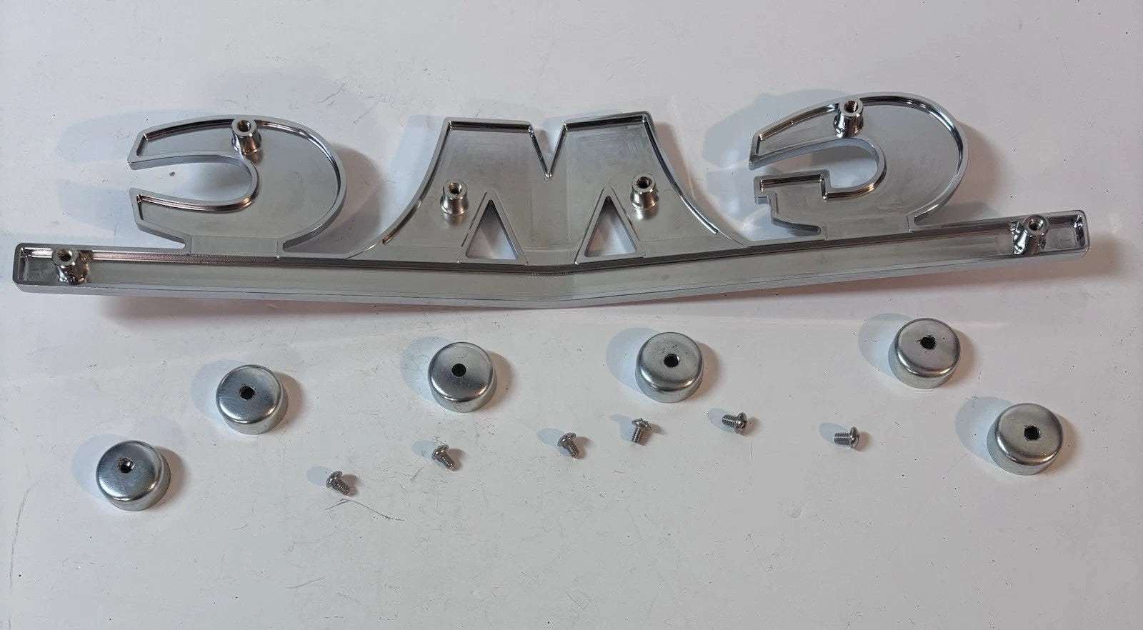 NEW 1947 - 1954 GMC Grill Truck front Emblem Caps Screws